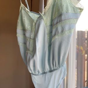 NWT Free People intimately free baby blue bodysuit w light green lace size XS.